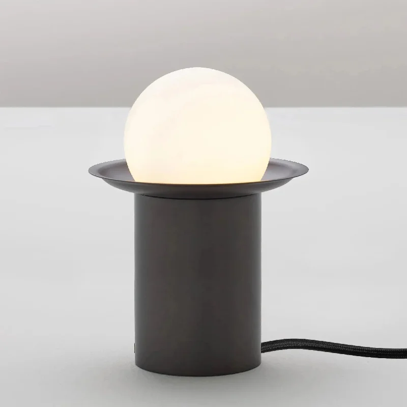 Track lighting with a decorative track designHigh - lumen track lighting for bright spacesJaned Table Lamp