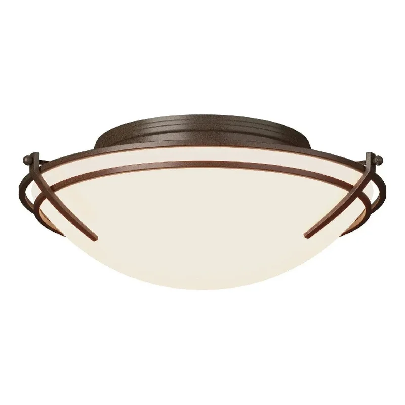 Track lighting with a brushed nickel finishTrack lighting with multiple heads for flexibilityTryne Flush Mount